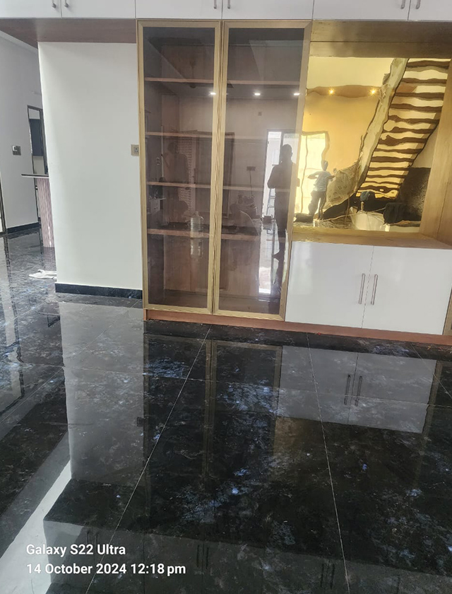 Elegant curved glass railing design in Madurai for Usilampatti resorts