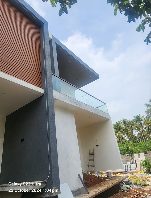 Modern glass canopy installation in Madurai for Nagamalai Pudukottai entrances